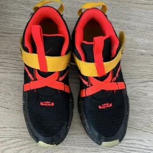 Boy’s Black &amp; Orange Sneakers From Nike Size 2y