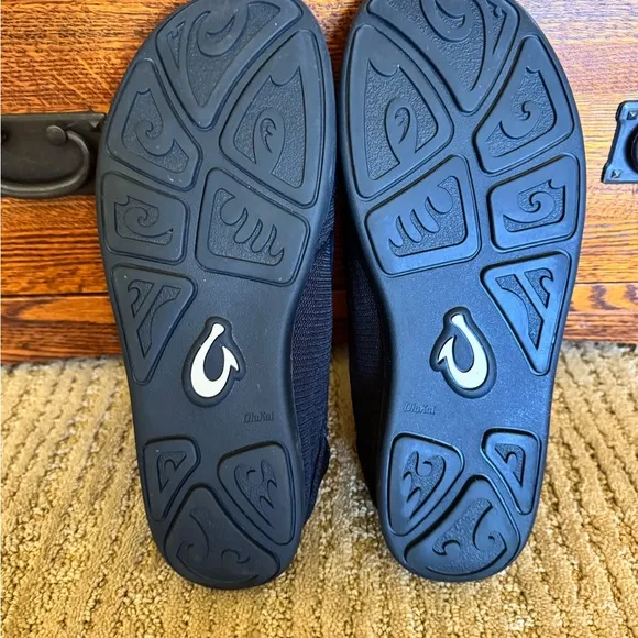 NWOT. Olukai Men's Black Slip-On Shoes