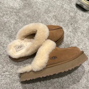 UGG Women's Tan Sheepskin Slippers