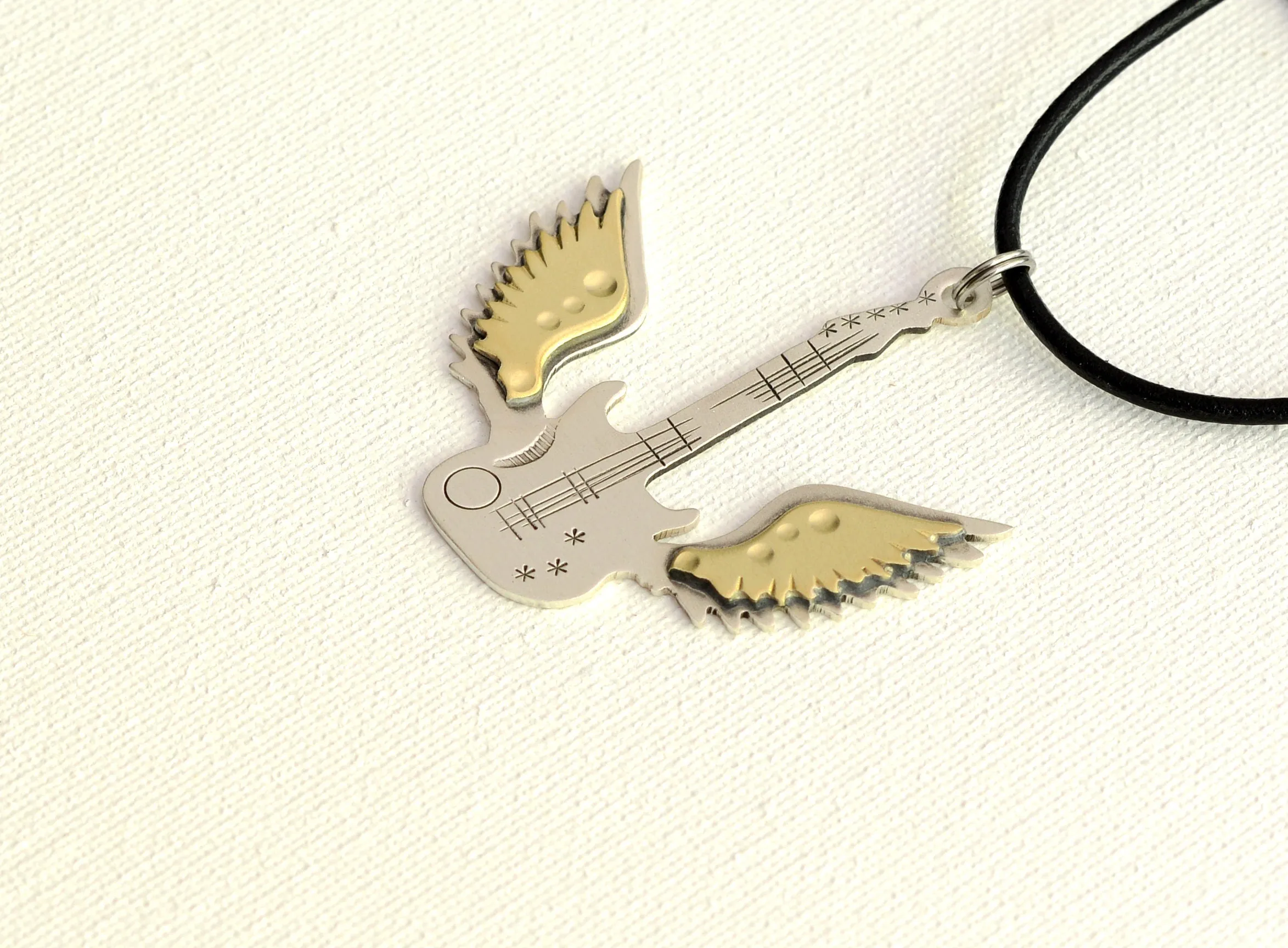 Winged guitar sterling guitar necklace with brass wings