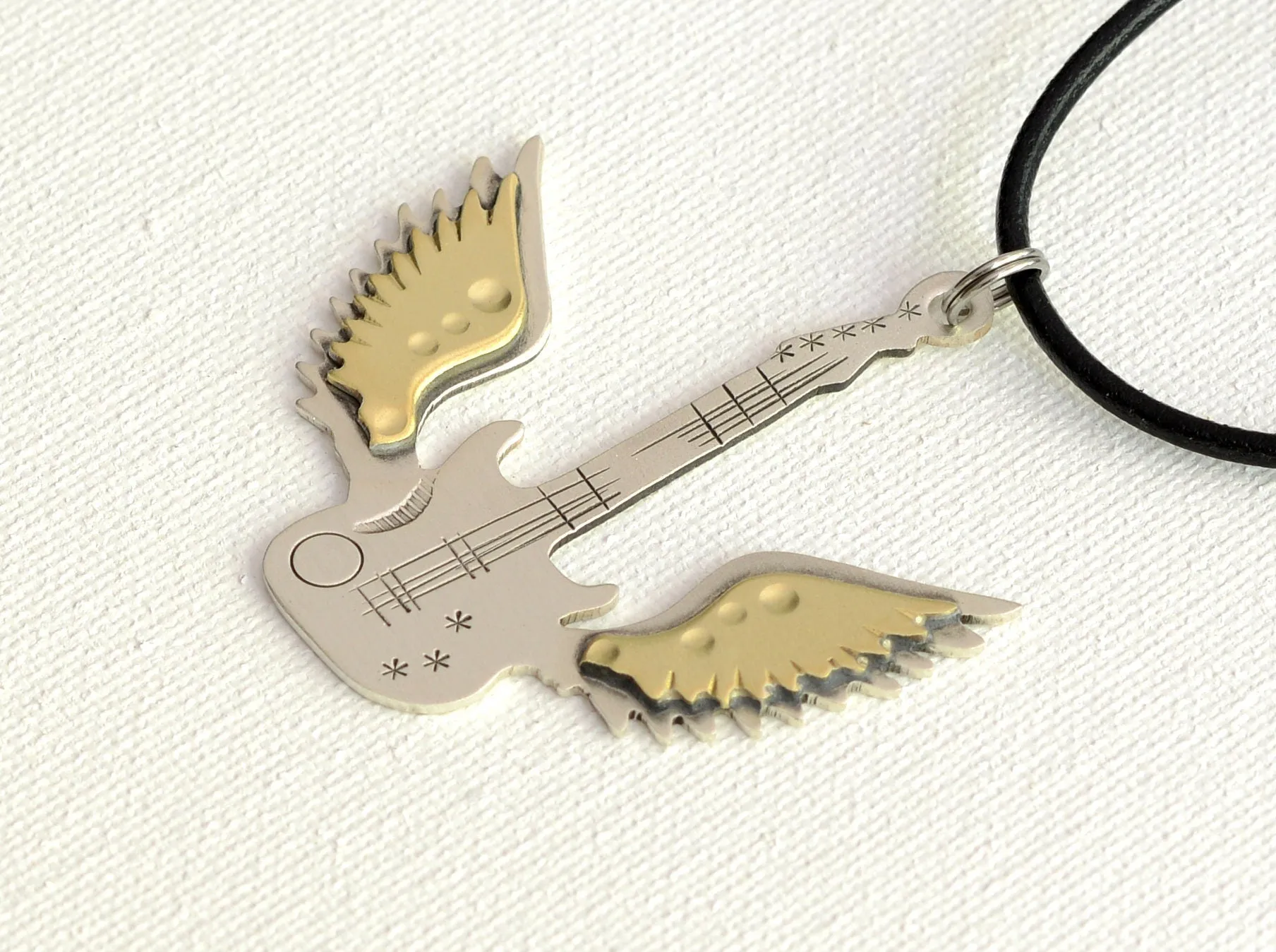 Winged guitar sterling guitar necklace with brass wings
